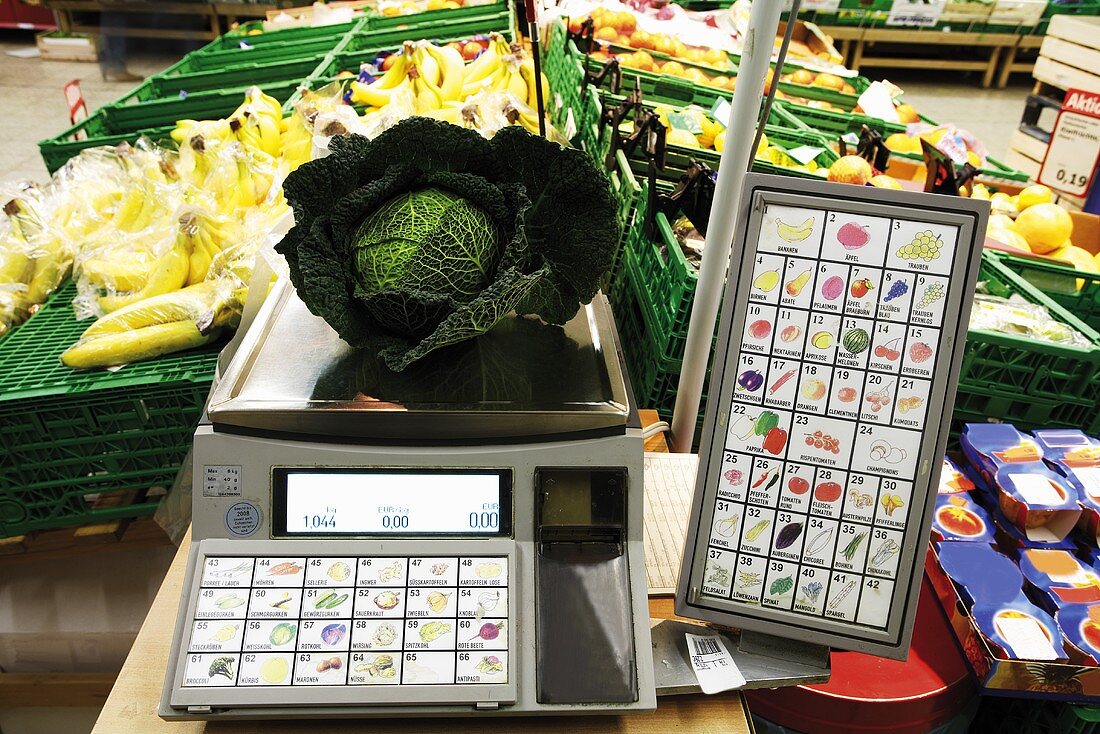 Savoy cabbage on supermarket scale