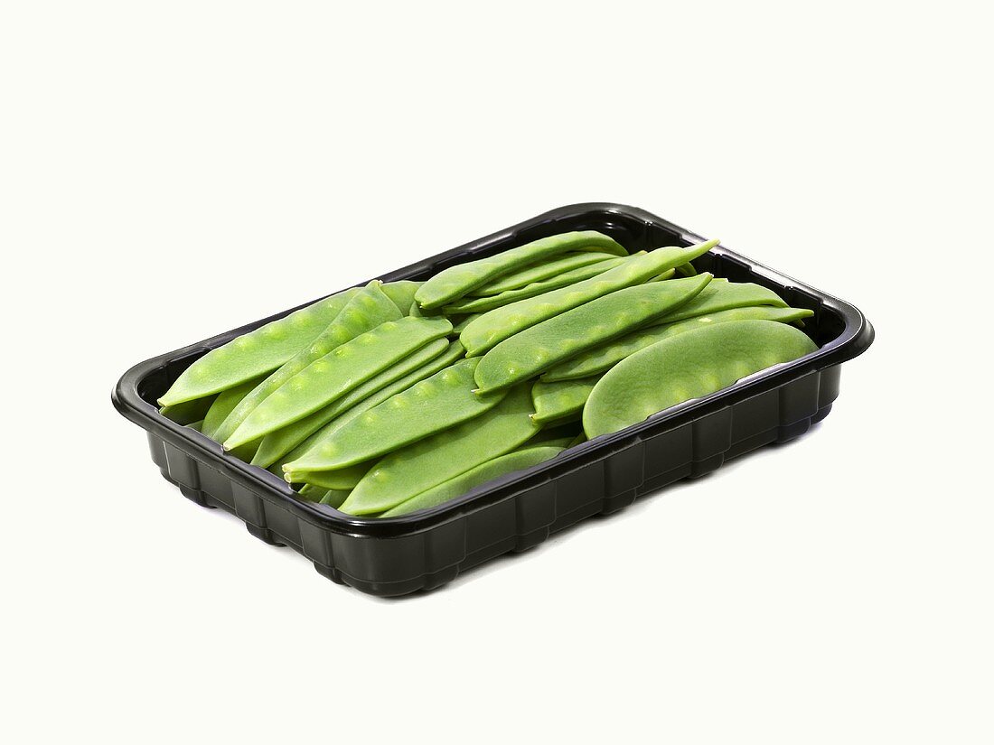Mangetout in a plastic tray
