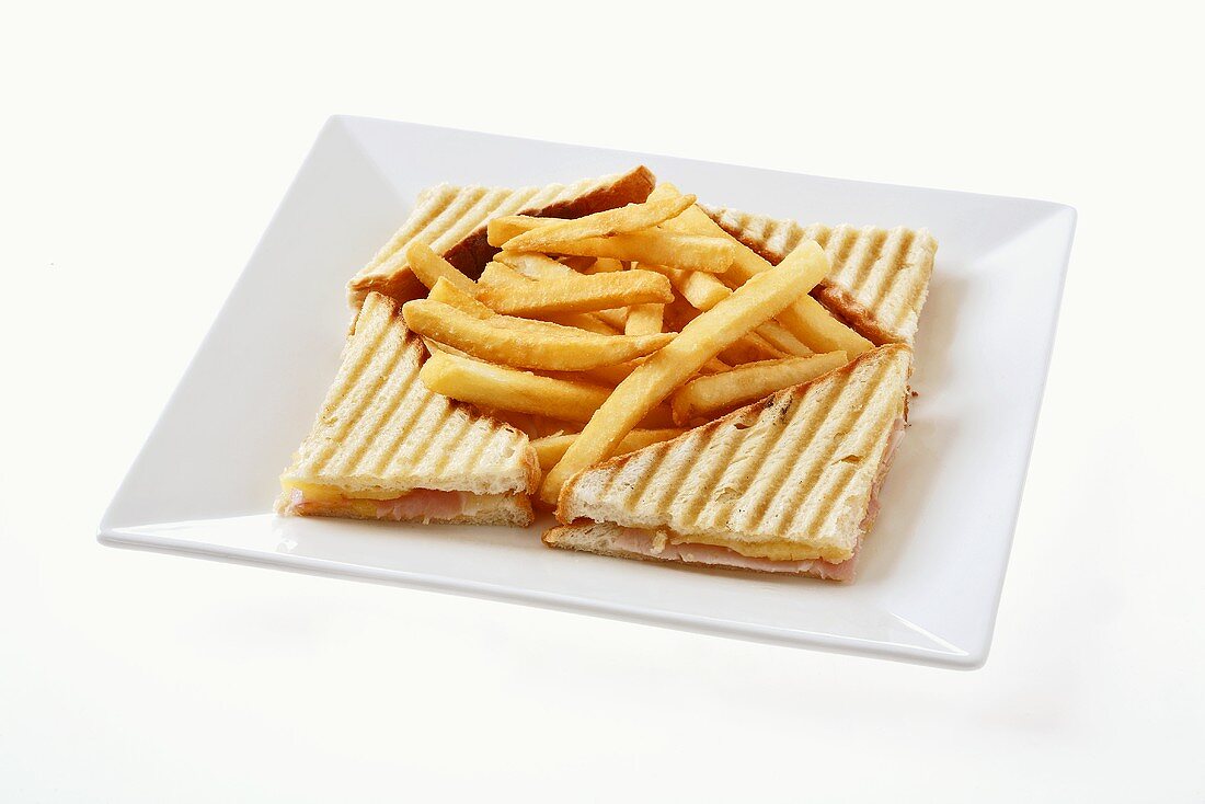 Cheese and ham toastie with chips