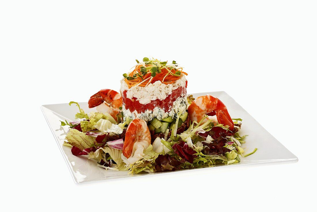 Tower of crab salad, tomatoes and blue cheese