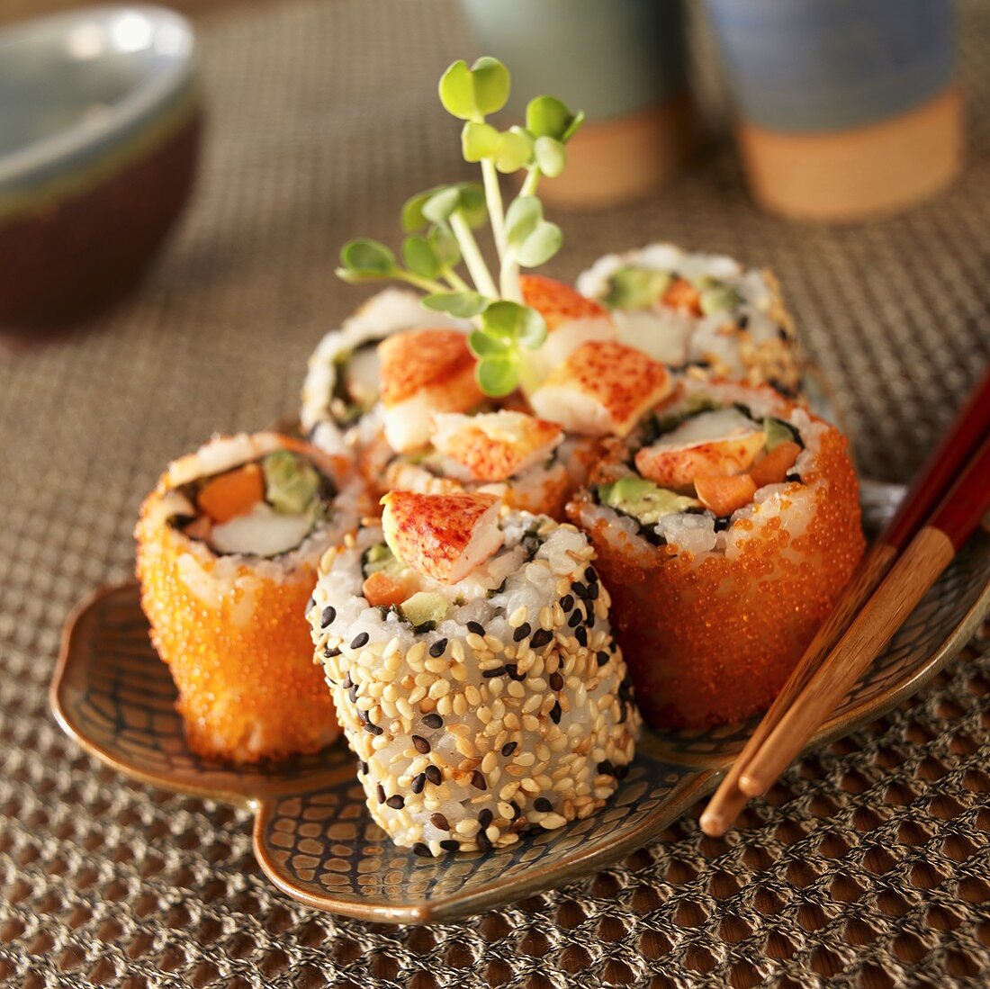 Lobster Sushi Rolls on a Plate; Chopsticks