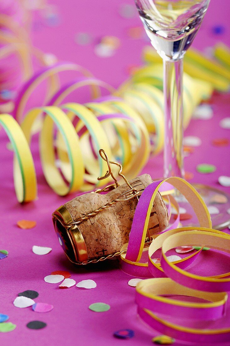Party streamers and wine cork