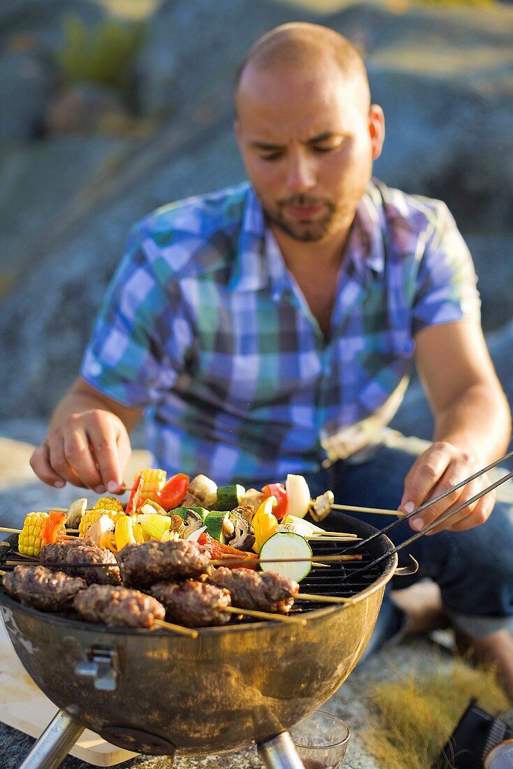 Man barbecuing