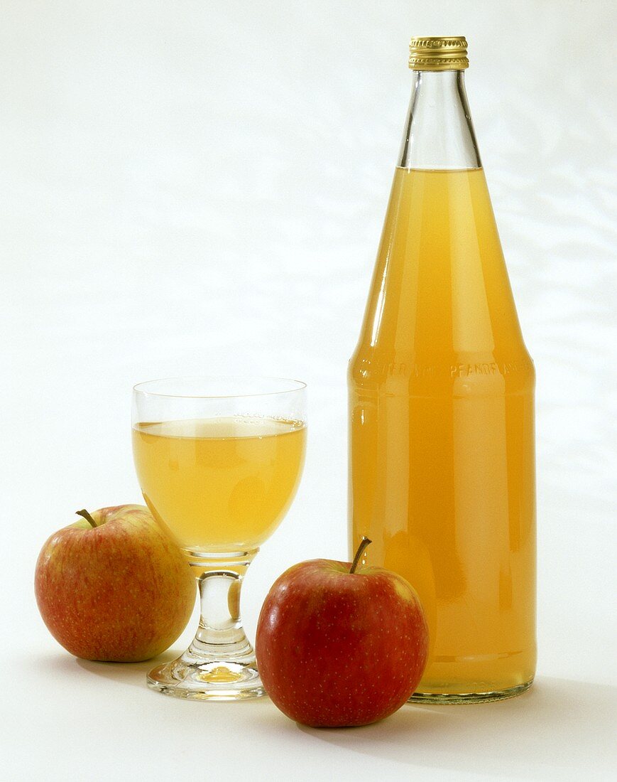 Natural Apple Juice; Bottle; Glass & Apples