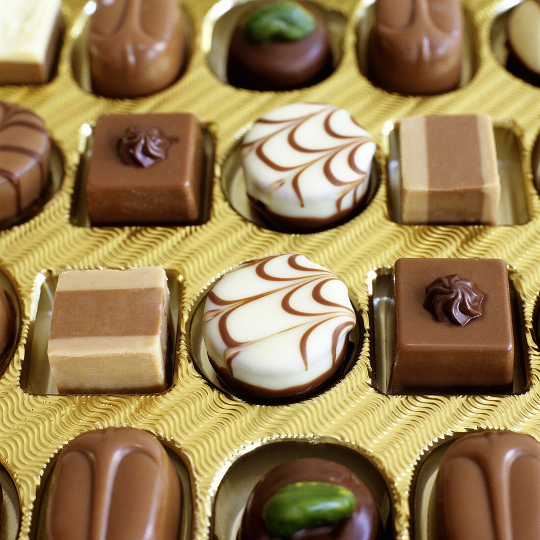 Assorted chocolates in chocolate box