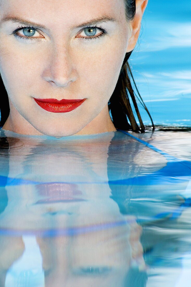 Woman relaxing in pool