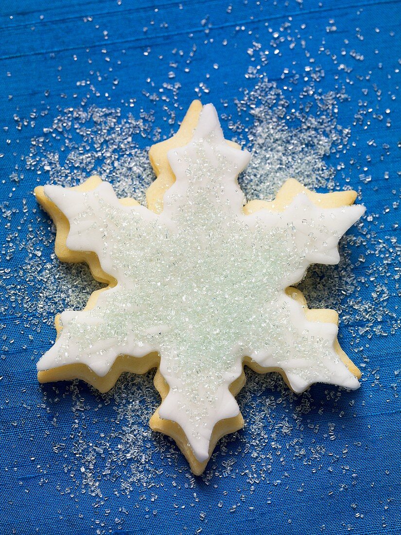Snowflake biscuit with blue sugar
