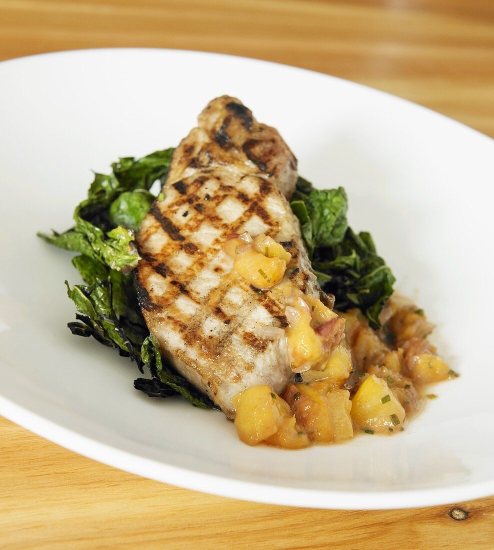 Grilled Pork Chop with Peach Chutney and Greens