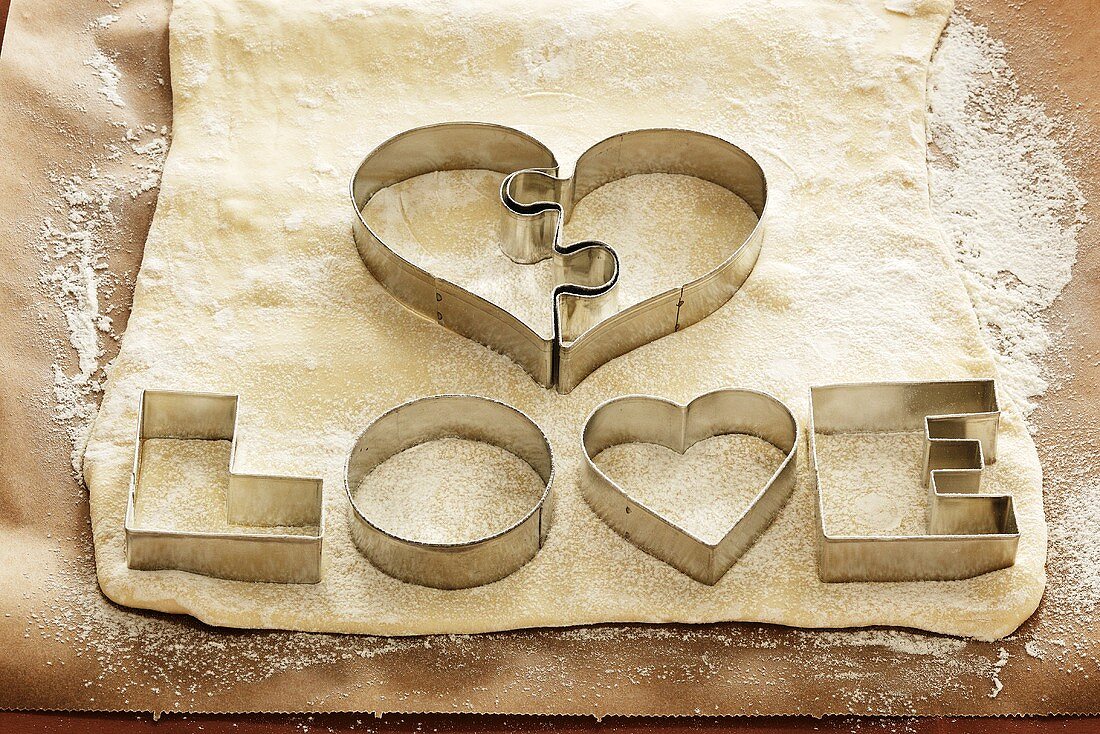 Biscuit cutters for 'LOVE' biscuits on dough