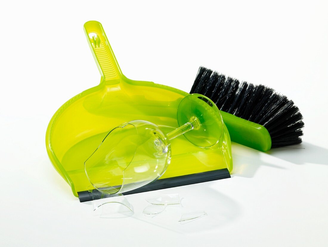 Dustpan and brush with broken glass