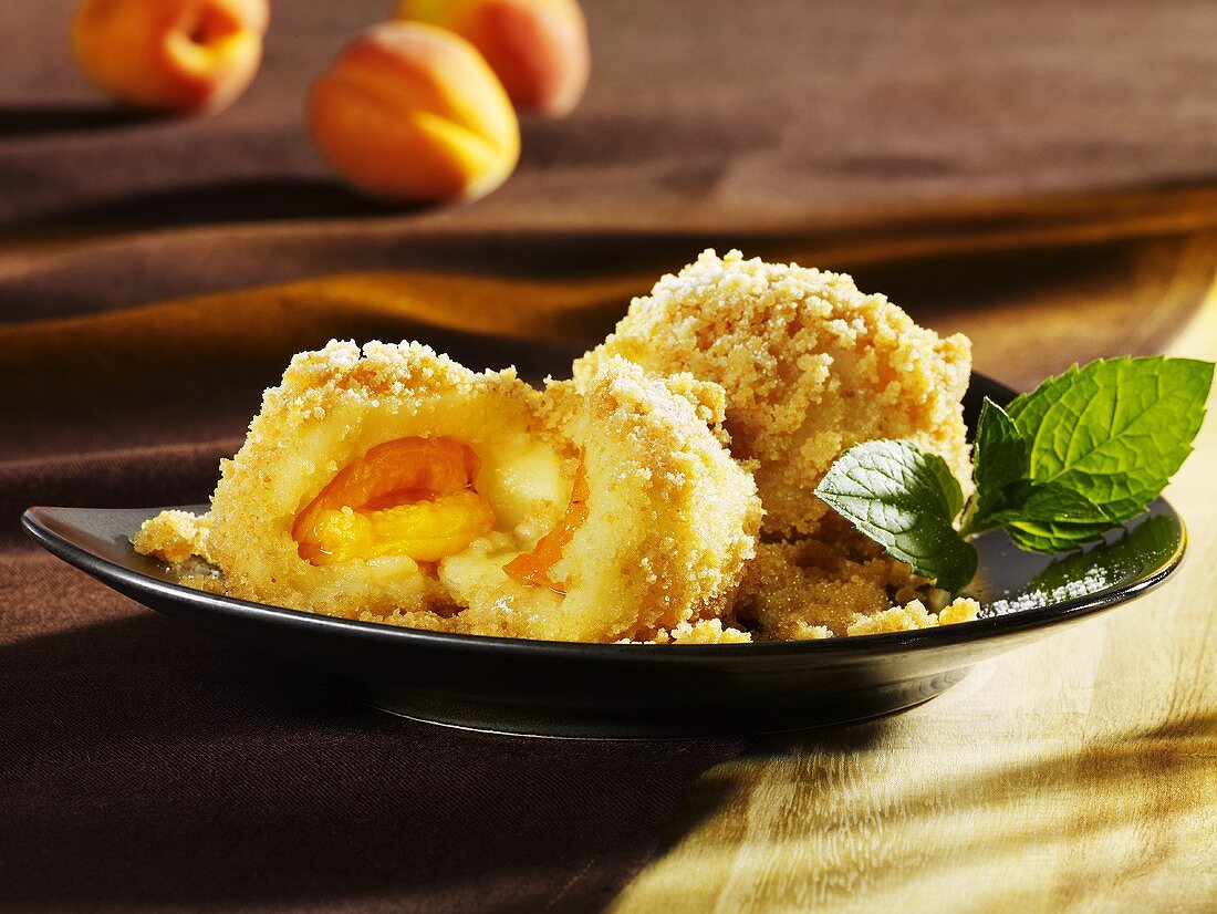 Apricot dumplings with buttered breadcrumbs