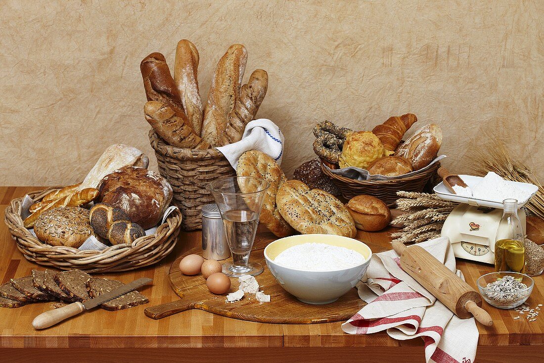 Still life with bread, bread rolls and baking ingredients