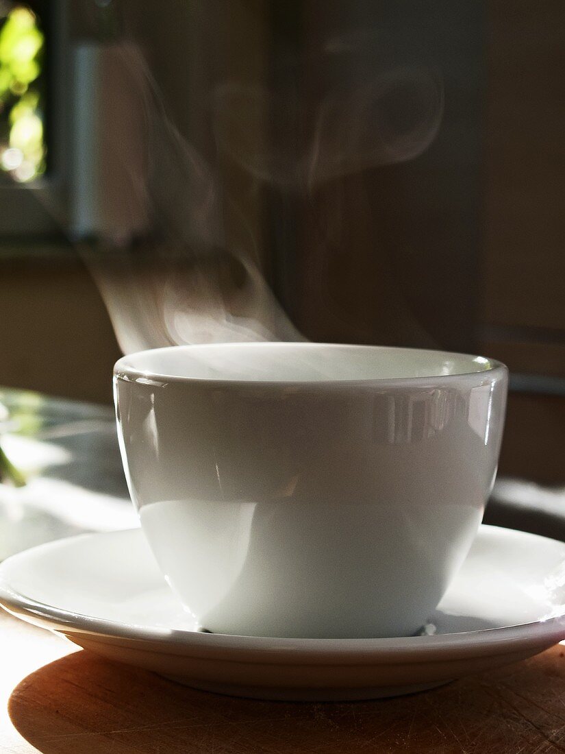 A steaming cup