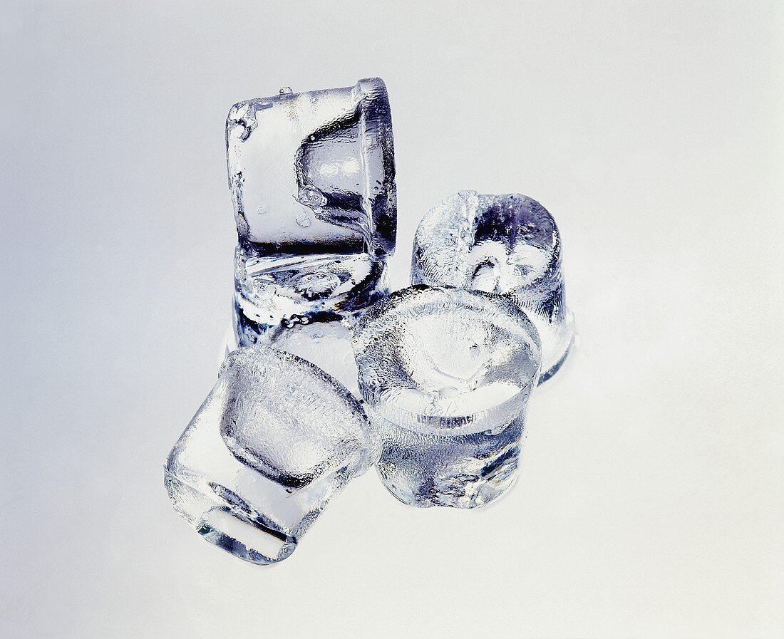 A few ice cubes; grey background