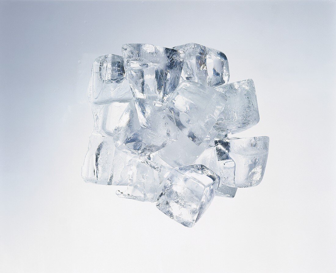 Ice cubes against a grey background