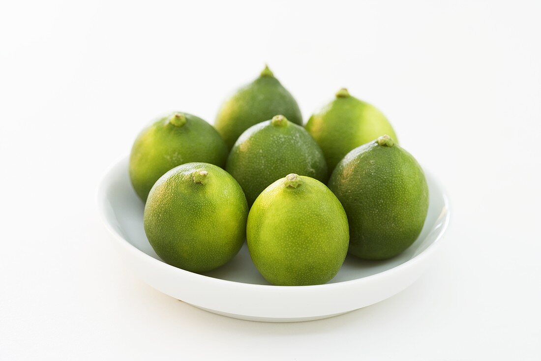 Several limes on plate