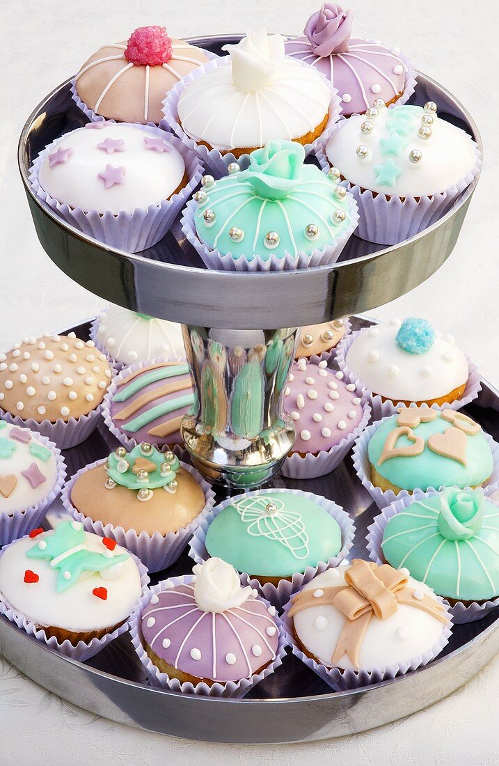 Assorted cupcakes on tiered stand