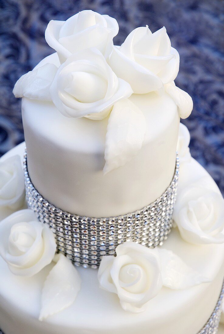 Wedding cake with rhinestones and white roses