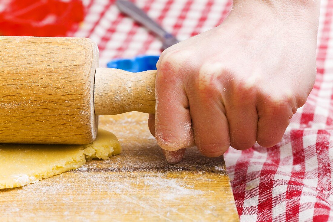 Rolling out biscuit dough