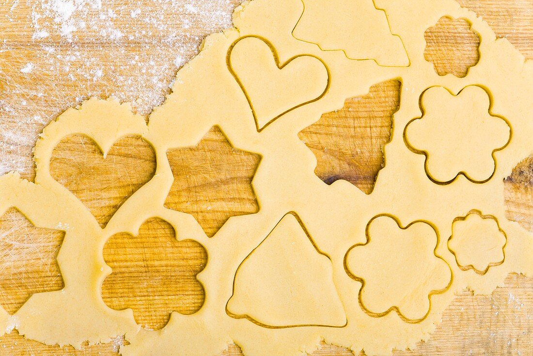 Biscuit dough with cut-out biscuits