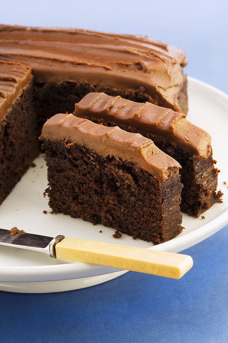 Chocolate cake, partly sliced