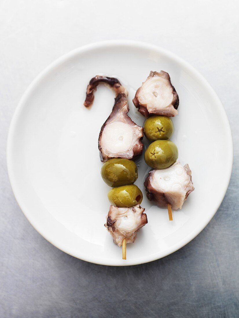 Octopus and olives on cocktail sticks (Spain)