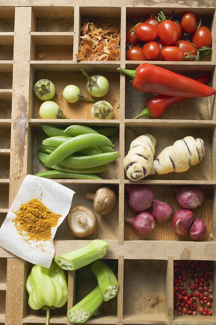 Various types of vegetables, spices & mushrooms in type case