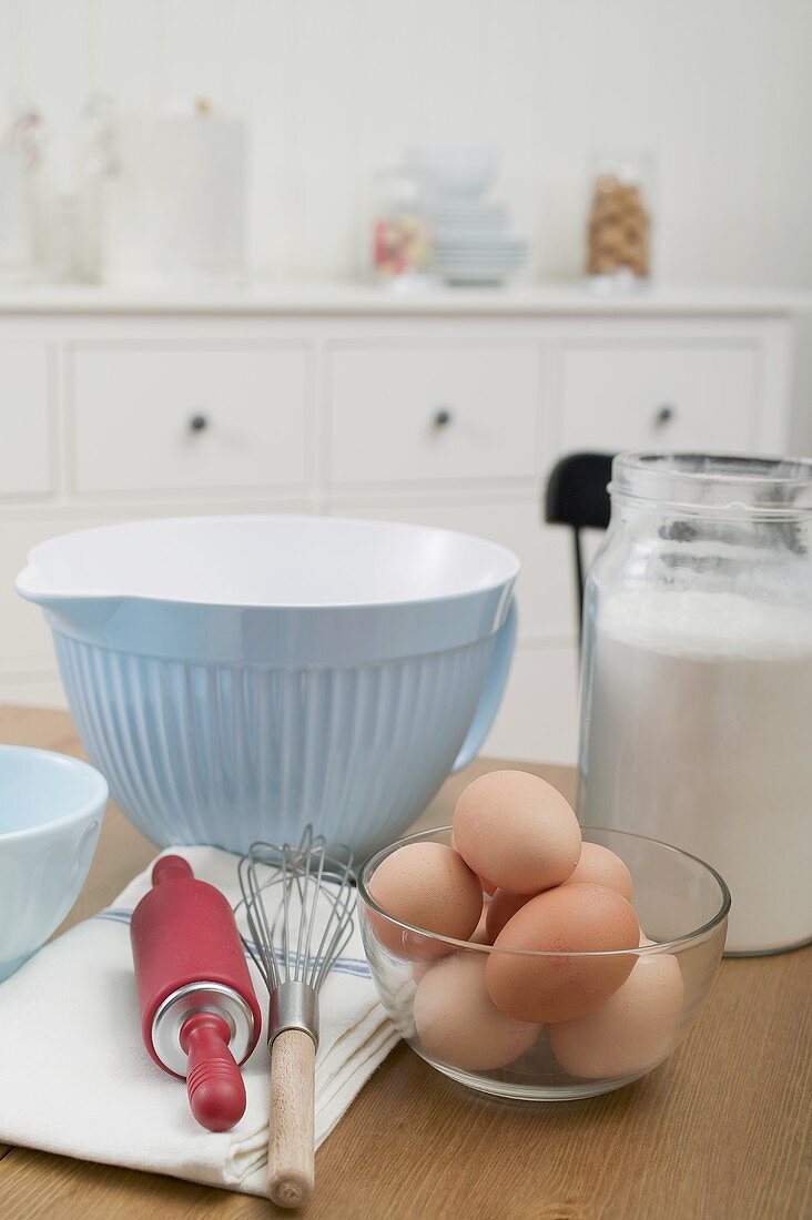 Various baking ingredients and utensils in kitchen