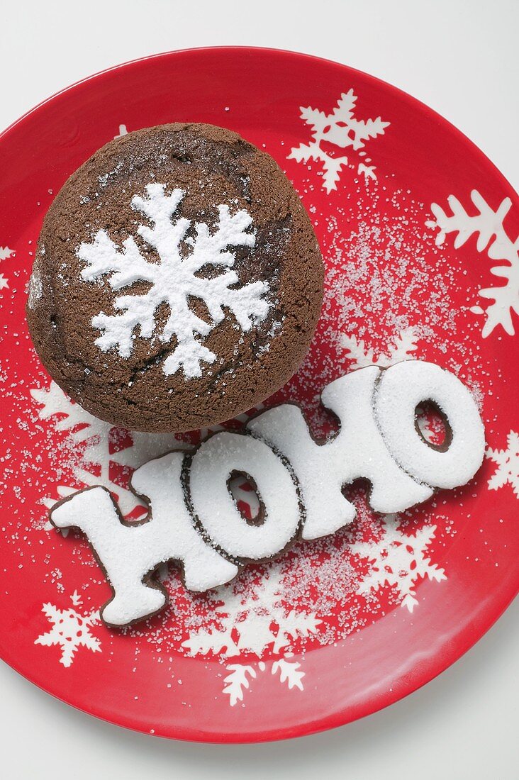 Chocolate muffin and the word HOHO on festive plate