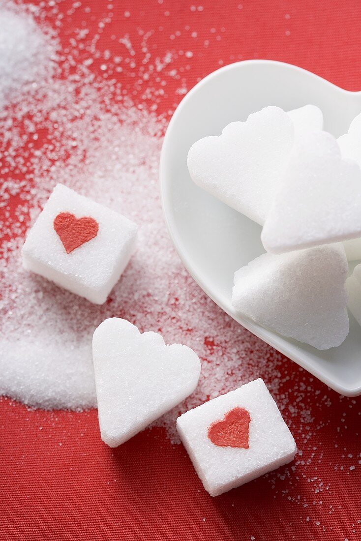 Sugar lumps, heart-shaped and with red hearts