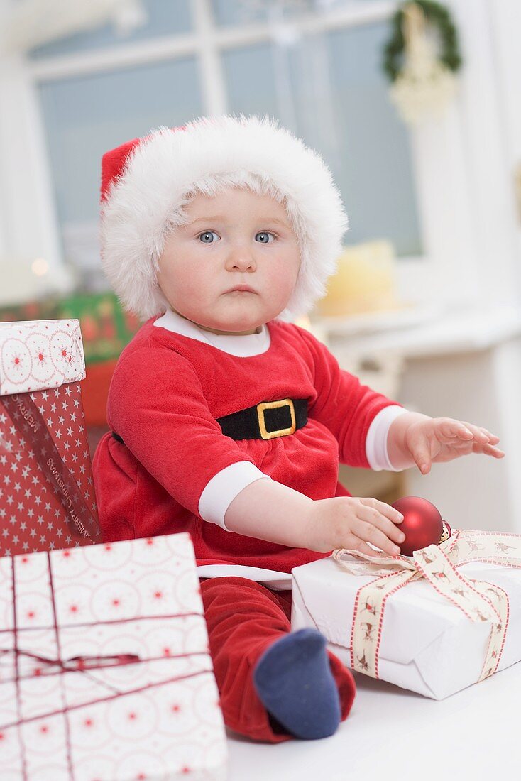 Baby with Christmas gifts