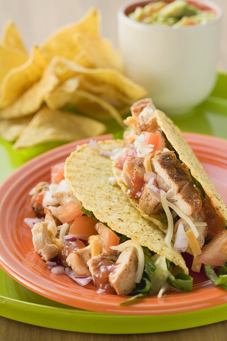 Chicken tacos, dip and nachos (Mexico)