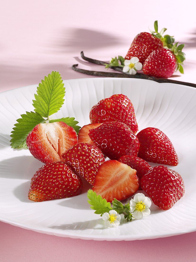 Fresh strawberries and vanilla pod