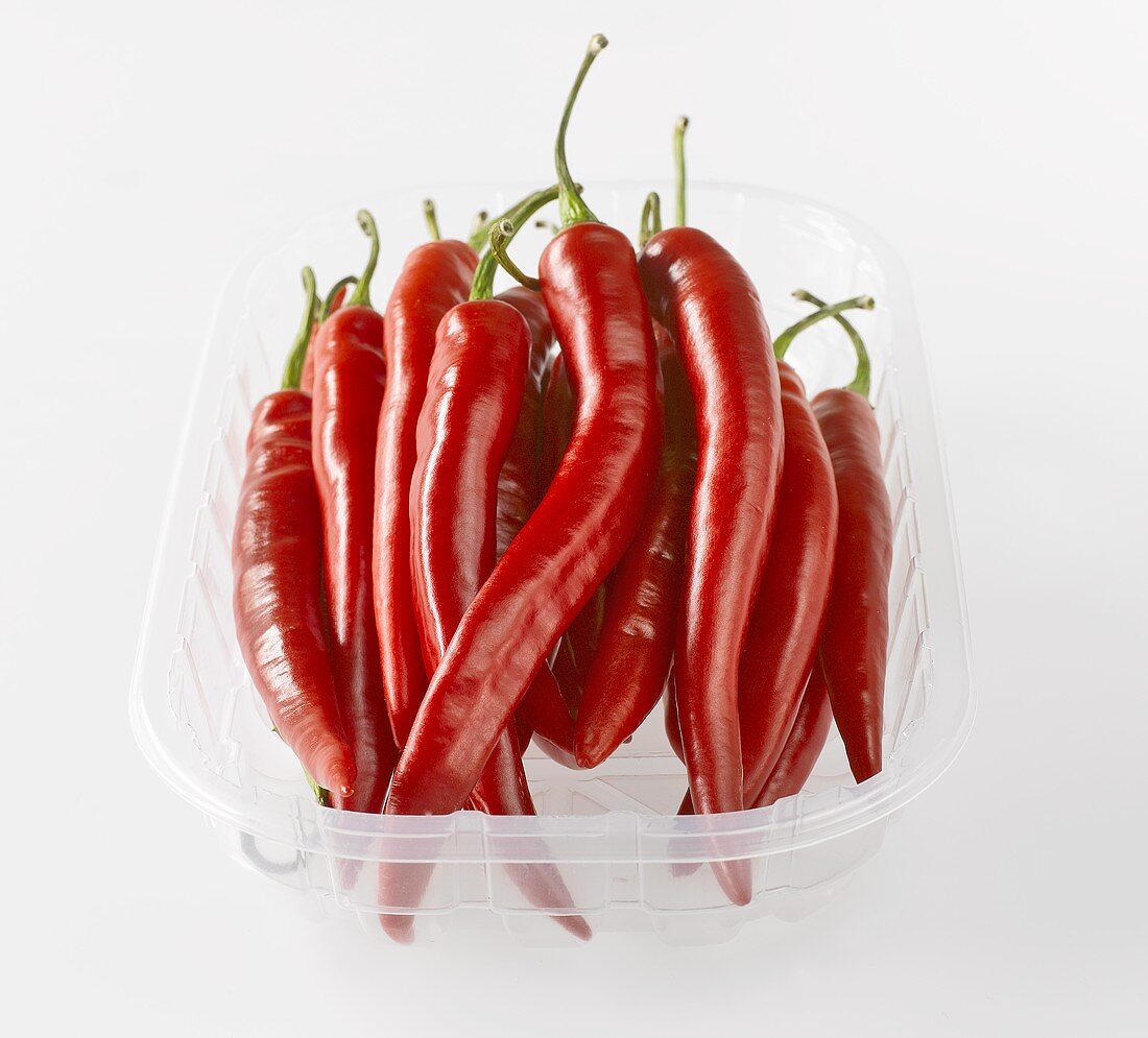 Red chillies in plastic tray