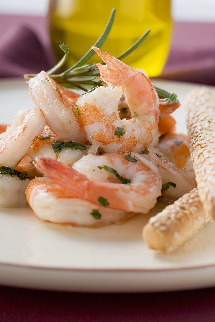Fried prawns with rosemary and sesame grissini
