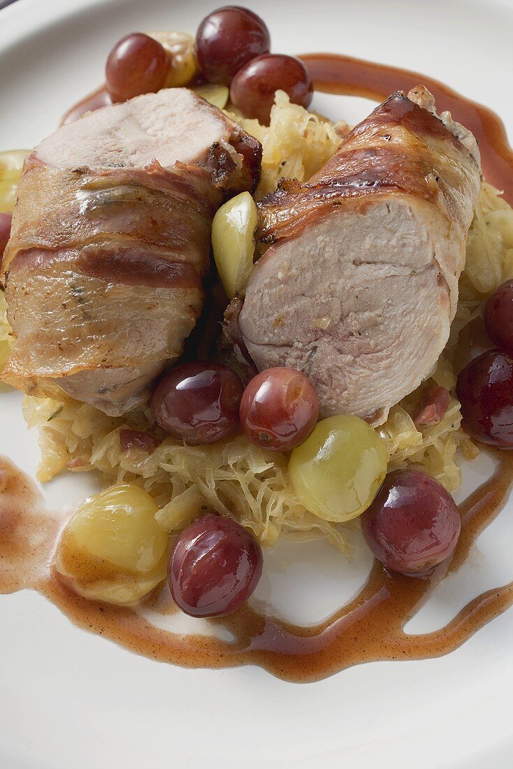 Pheasant breast with bacon, sauerkraut and grapes
