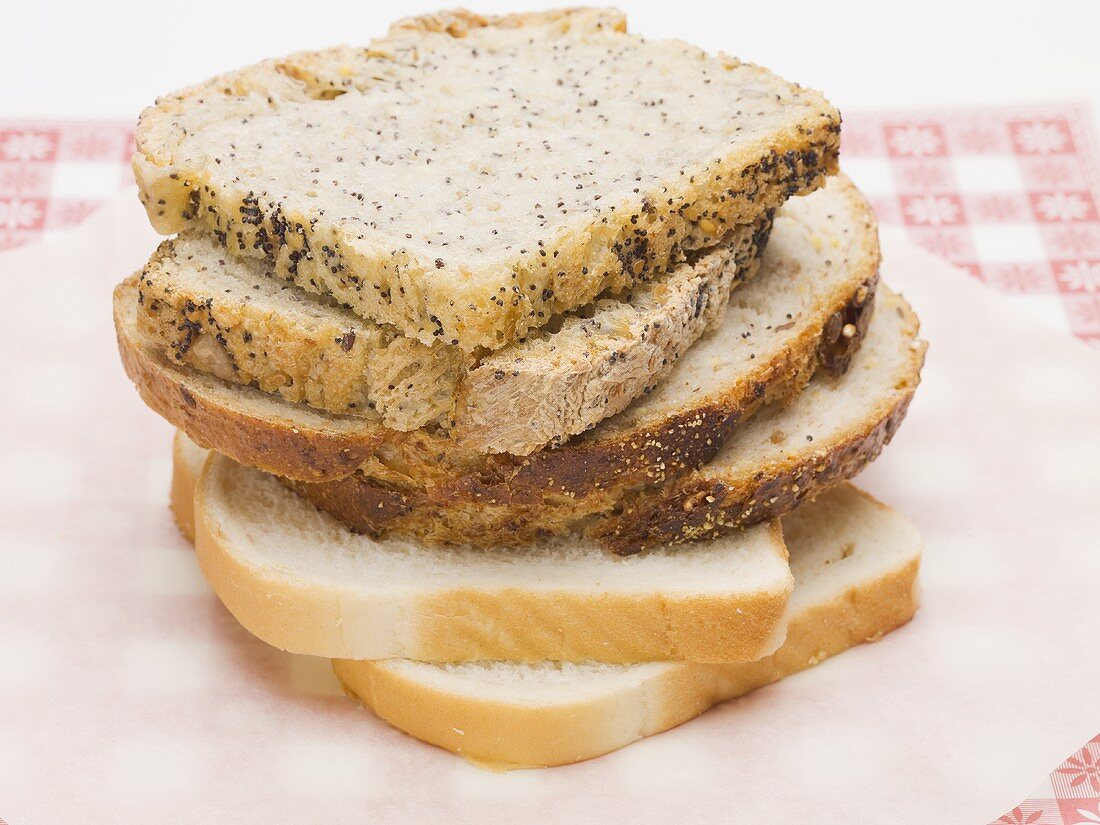 Slices of different types of bread, stacked