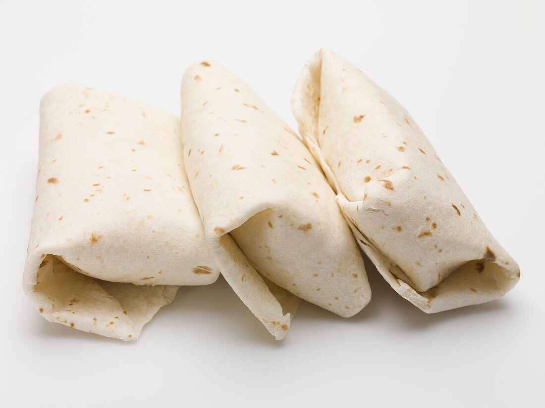 Three tortilla parcels