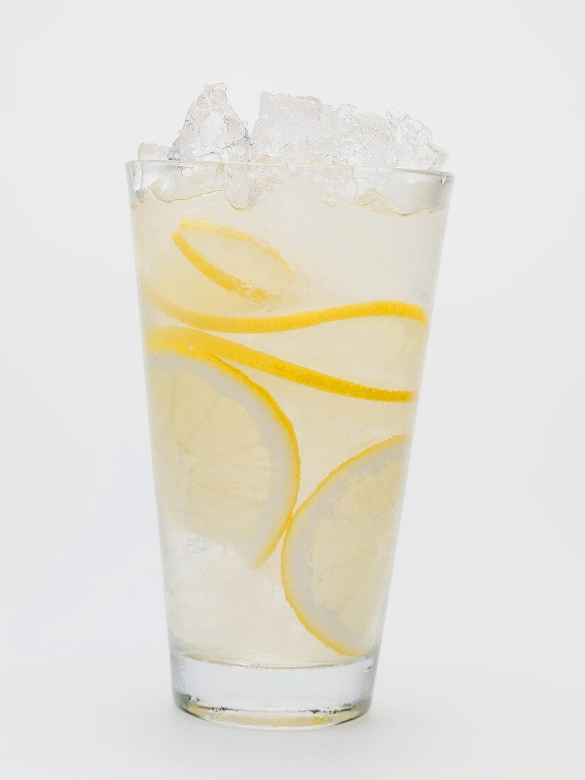 A glass of lemonade with crushed ice