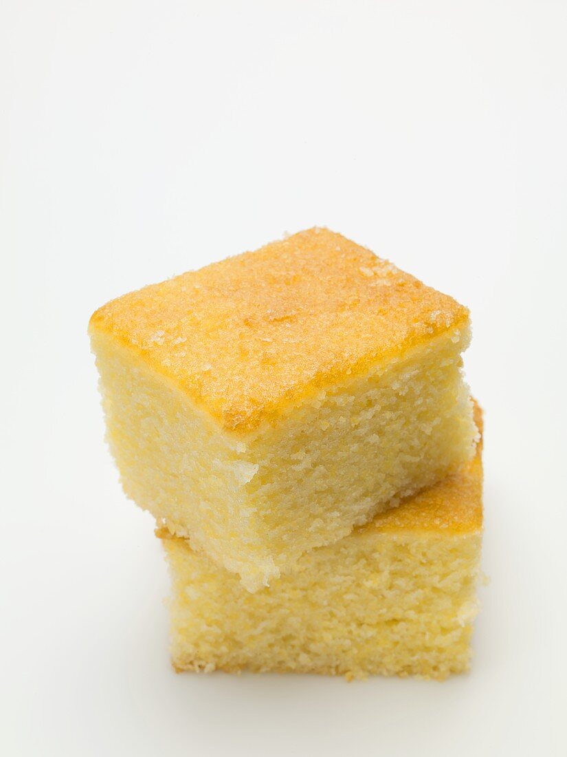 Two cubes of cornbread