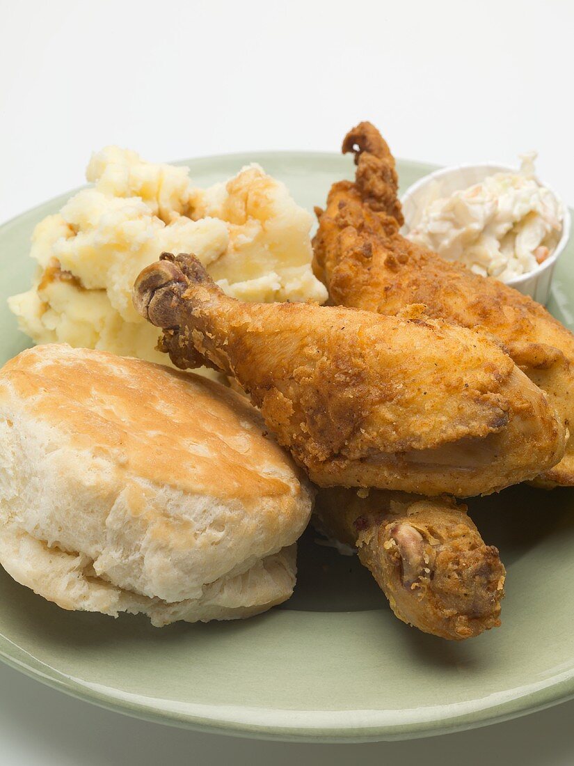 Fried chicken with mashed potato, coleslaw and scone