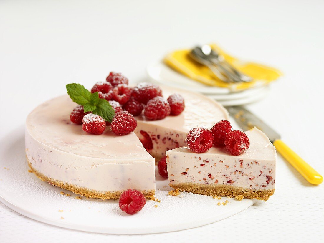 Raspberry cheesecake, a piece cut