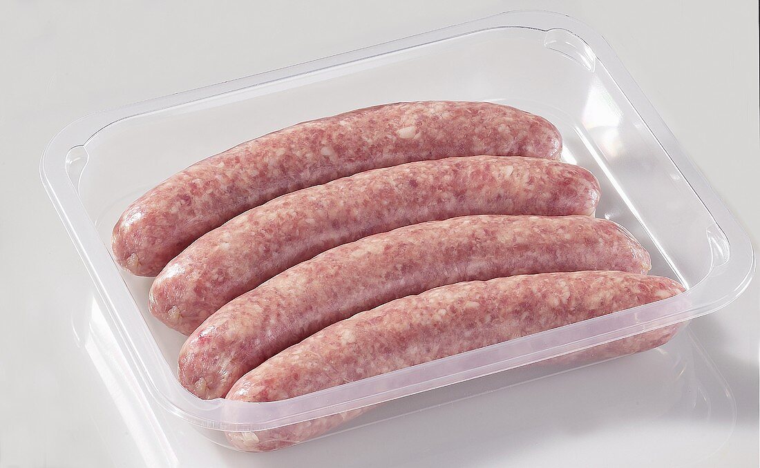 Four sausages in plastic container