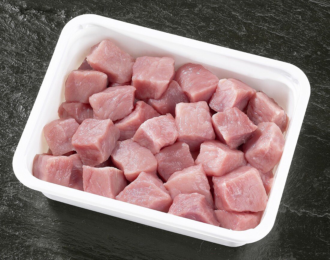 Diced pork in plastic container