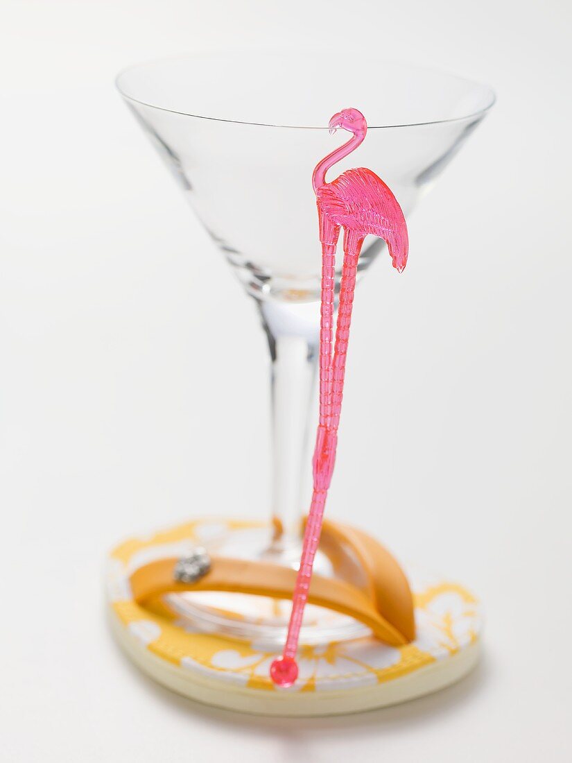 Empty cocktail glass with flamingo