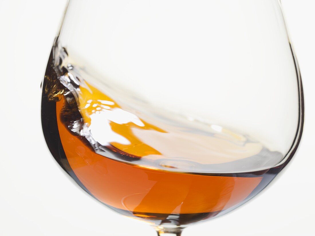 Cognac swirling in a glass