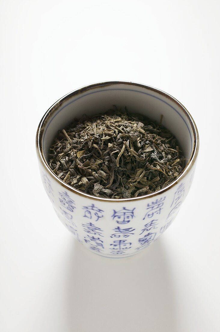 Tea leaves in Asian bowl
