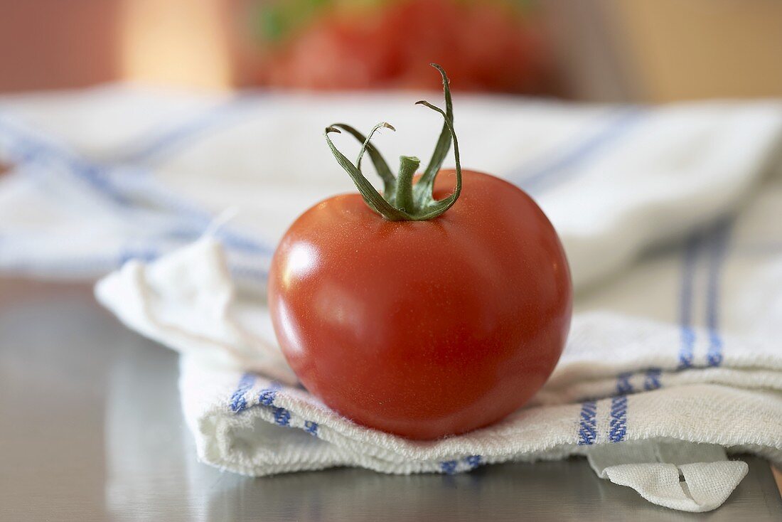 Tomato on tea towel