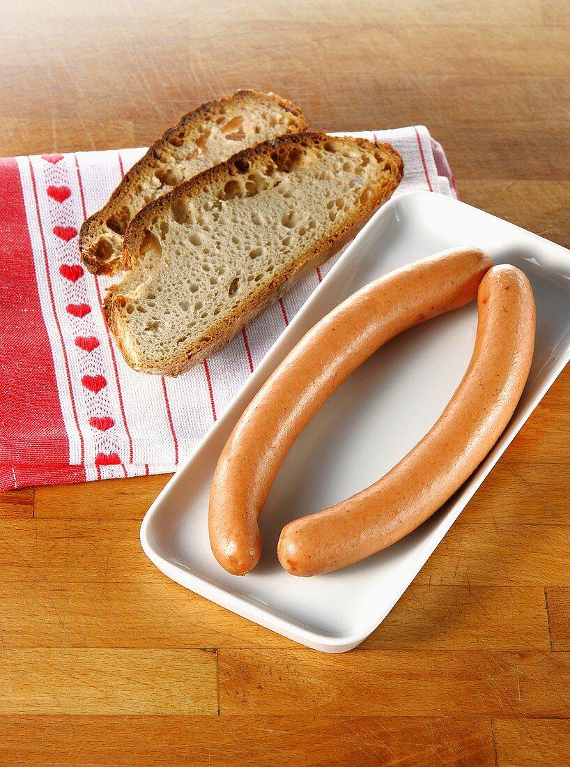 Frankfurters and two slices of bread