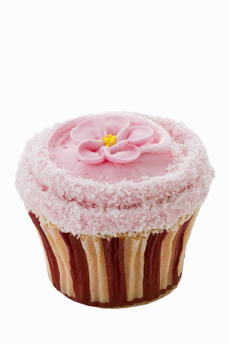 Cupcake with pink icing and sugar flower